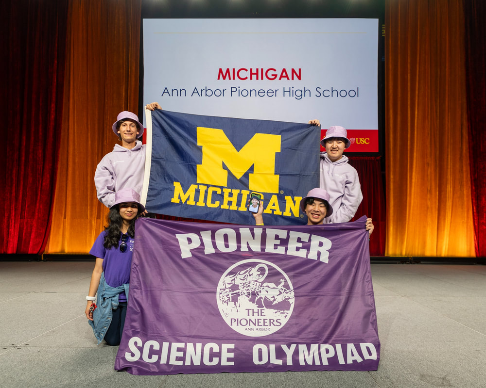 Pioneer Science Olympiad students standing together at the University of Southern California.