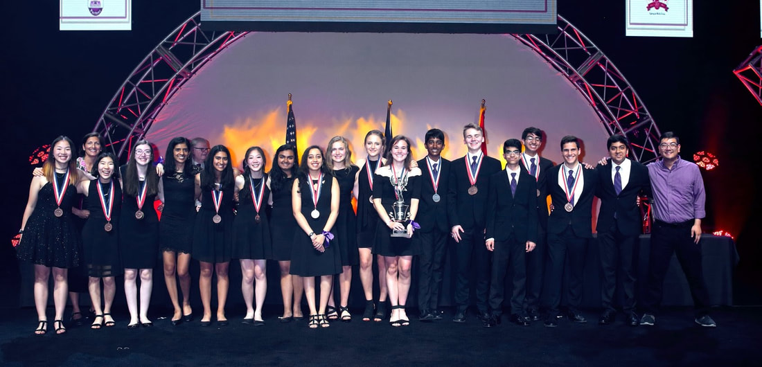 Pioneer Science Olympiad students standing together outside.